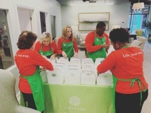 Group of staff packing lunches