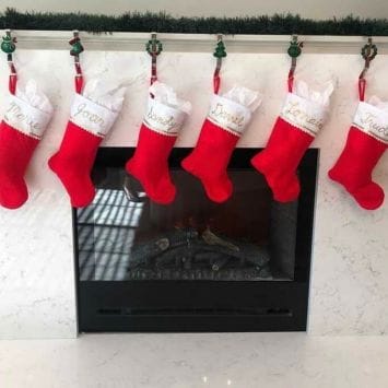 Christmas Stockings hanging on Fire place 