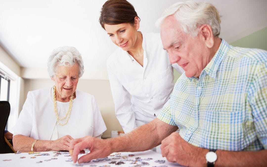 Elderly Couple doing a Puzzle